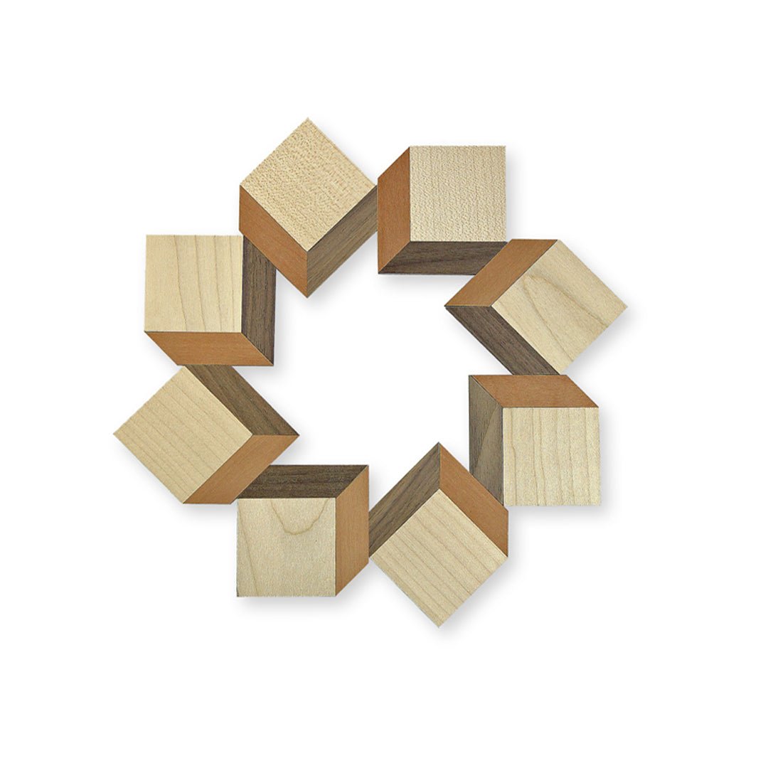 Wooden puzzle in a geometric shape on a white background