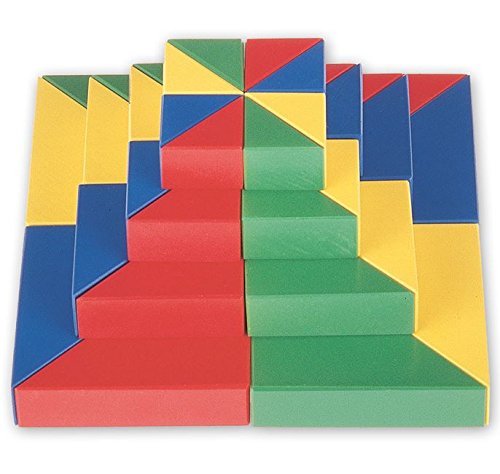 Colorful geometric wooden blocks arranged in a pattern on a white background