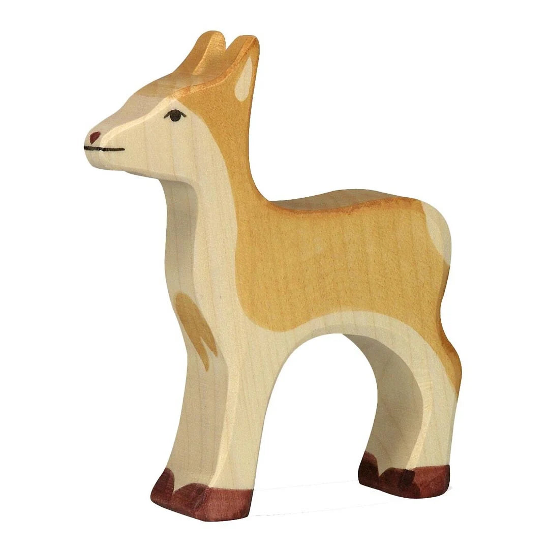 Wooden deer figure on a white background
