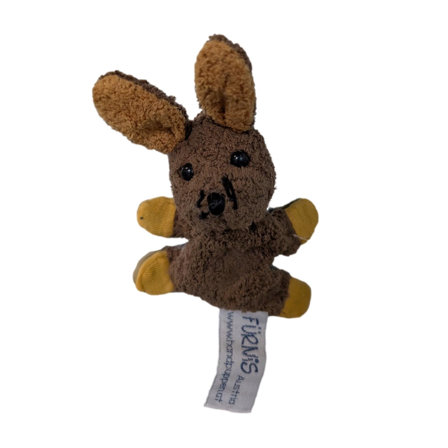 Brown plush rabbit magnet toy with a visible brand tag on a white background
