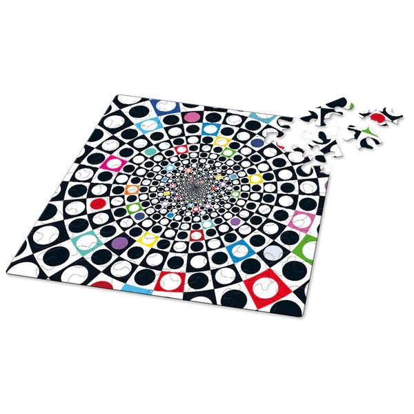 Colorful dot patterned puzzle on a white background