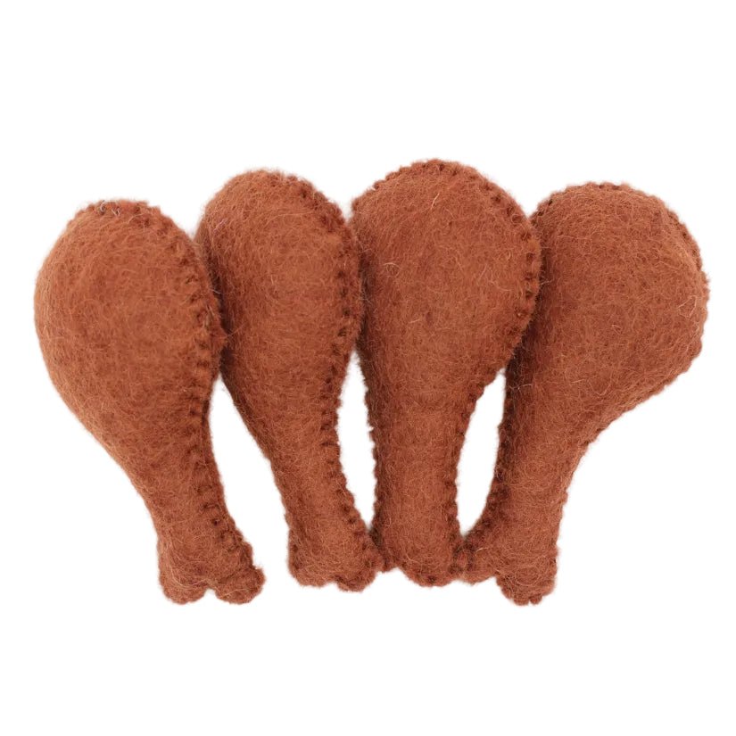 4 felted drumsticks on a white background