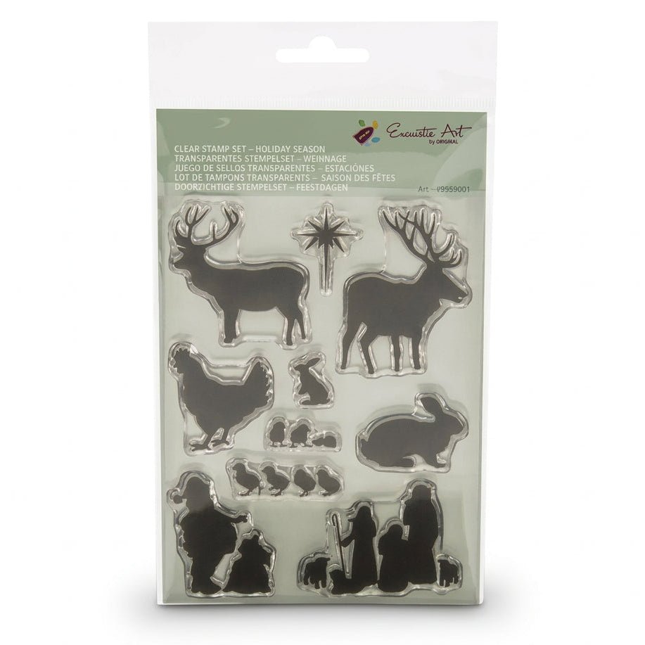 Encaustic Art branded holiday clear stamp set featuring deer, nativity, bunnies, and chickens on a white background