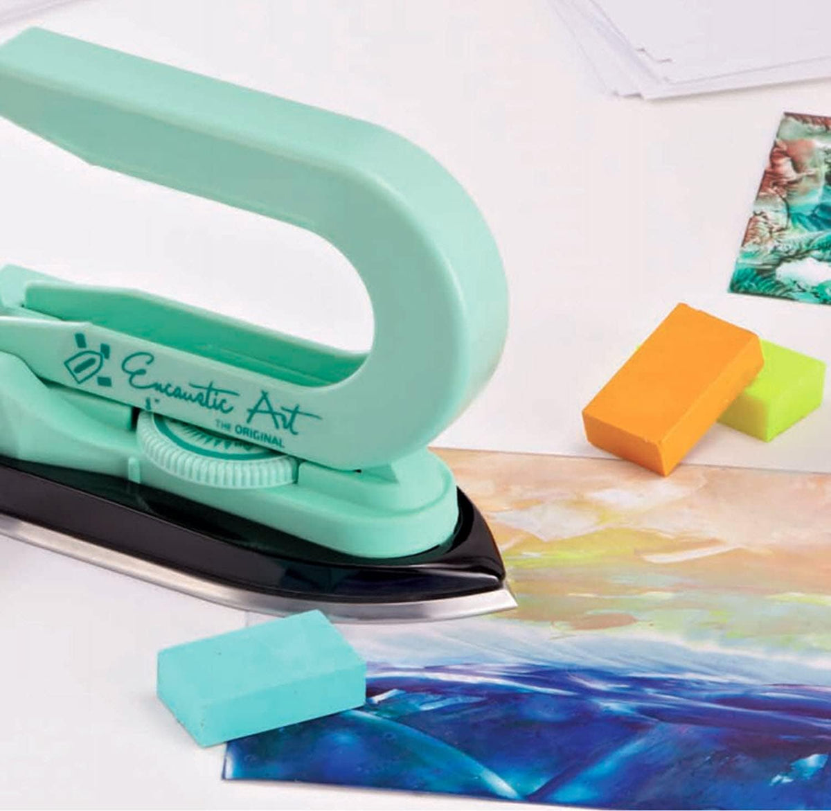 Mint green Encaustic Art painting iron with pigmented wax blocks on a landscape