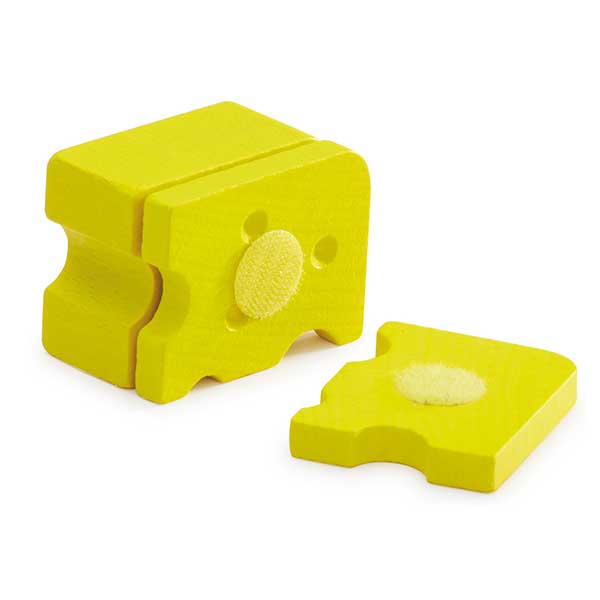 Wooden toy cheese with velcro slices on a white background