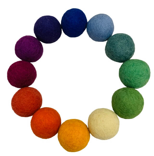 12 colors of felt balls arranged in a circle