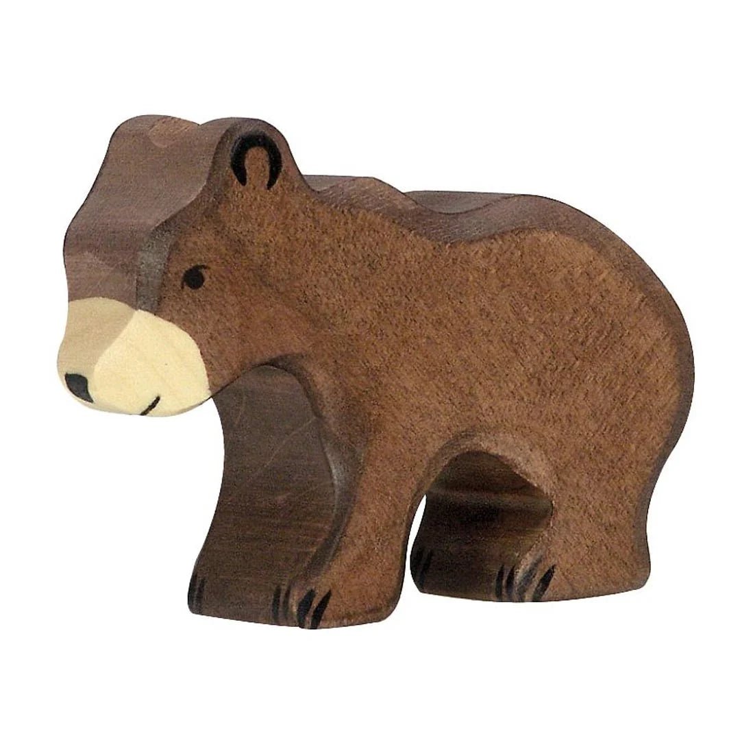 Wooden bear figurine on a white background