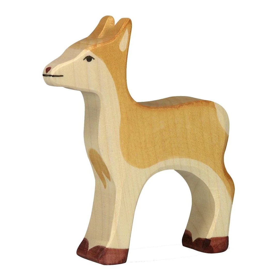 Wooden deer figure on a white background