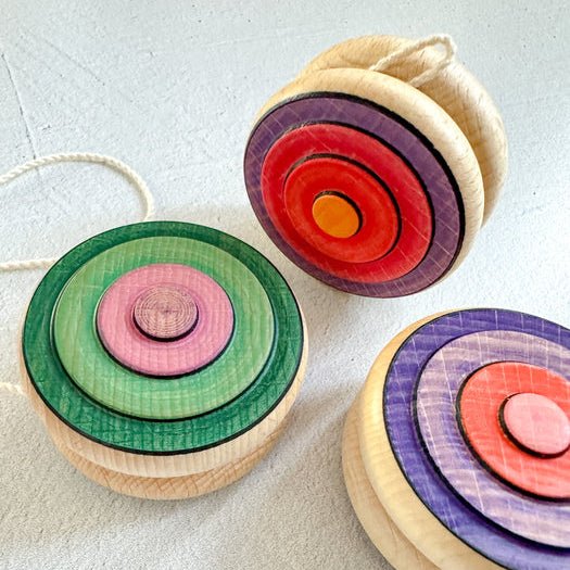Colorful yoyos on a light background