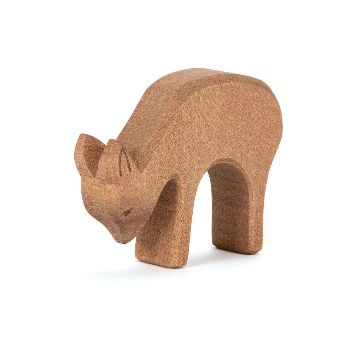 Wooden deer figurine on a white background