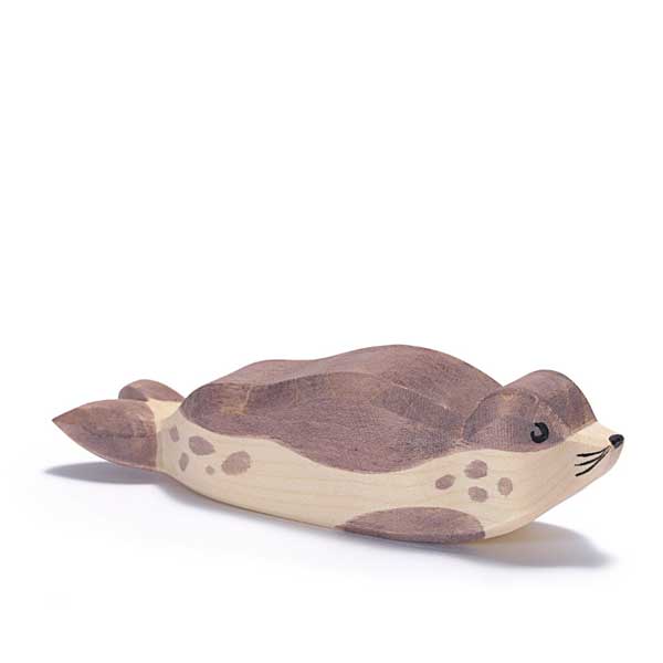 Wooden seal toy on a white background