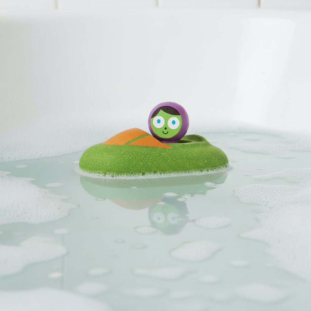 Green toy speedboat with driver floating in a bathtub