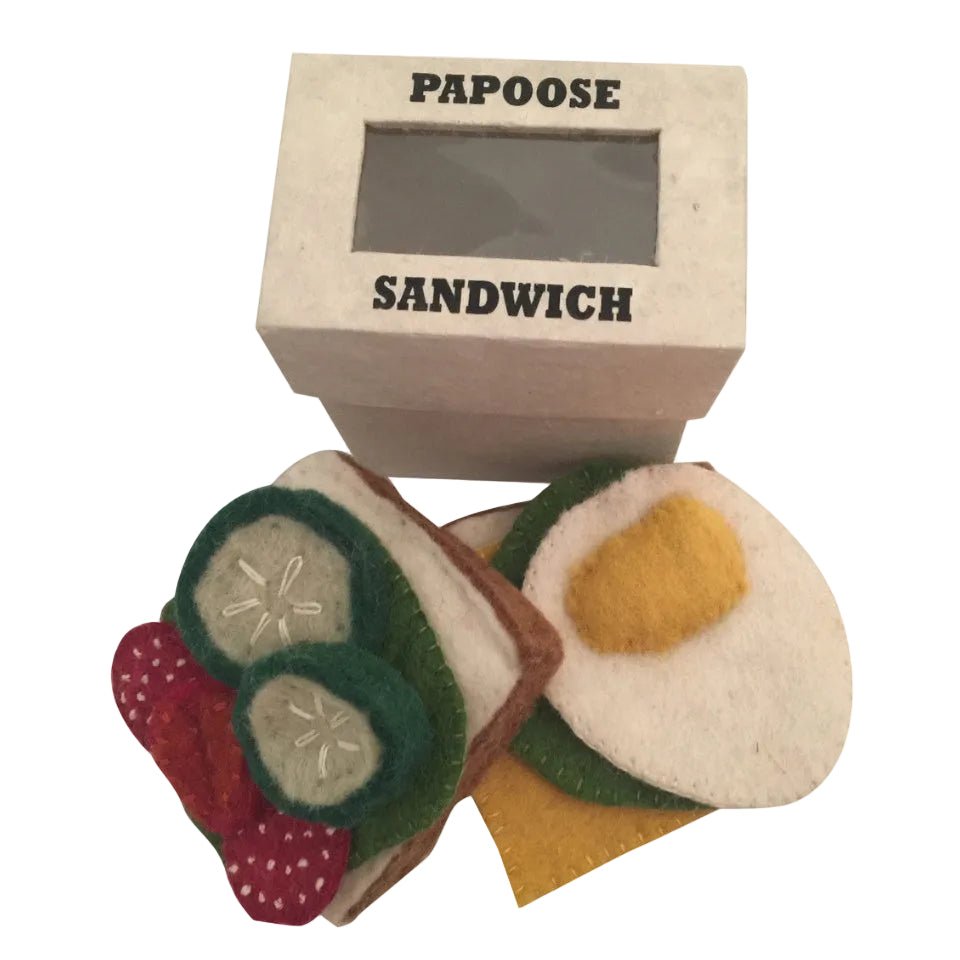 Box that says Papoose Sandwich with felt sandwich ingredients on a white background