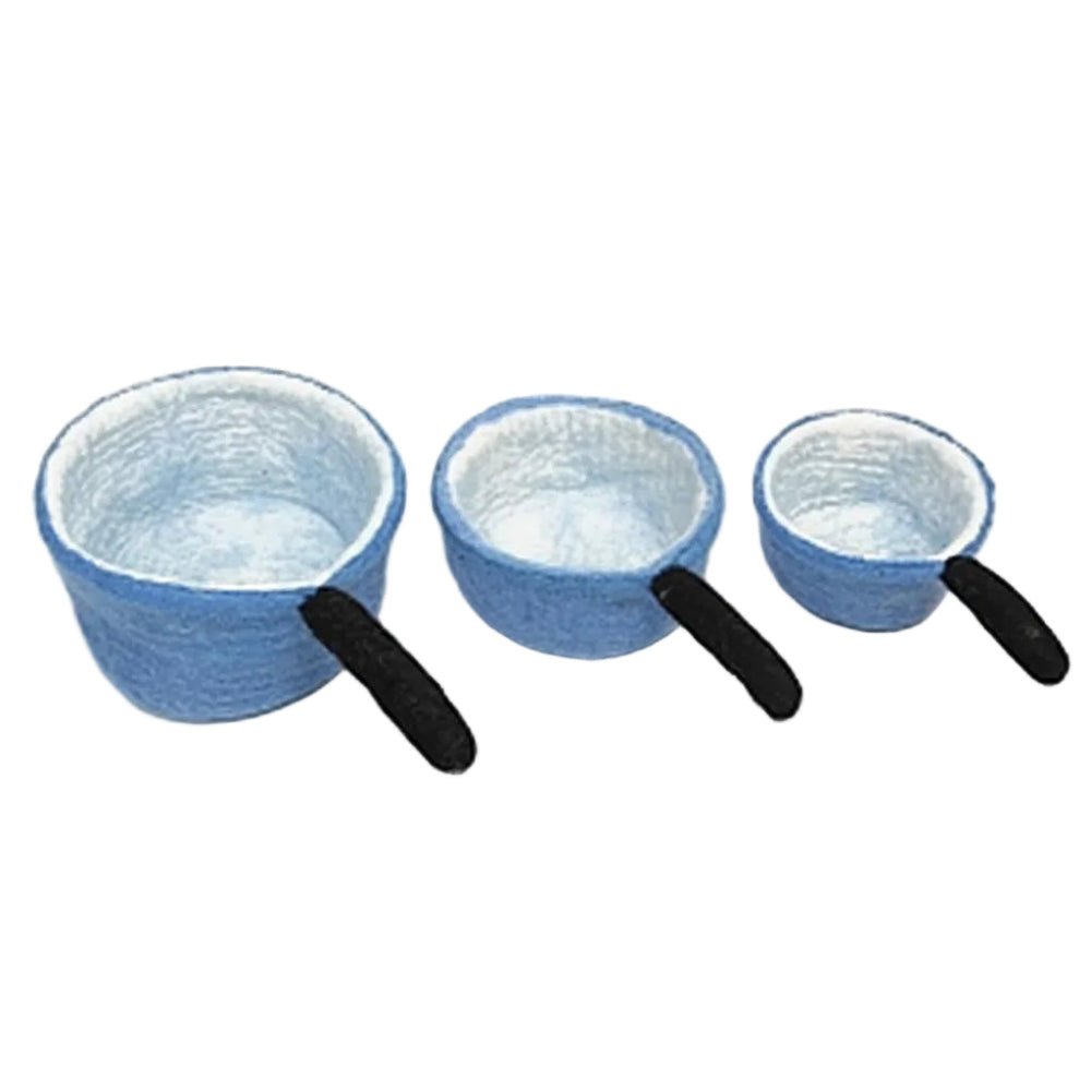 3 felted saucepans on a white background