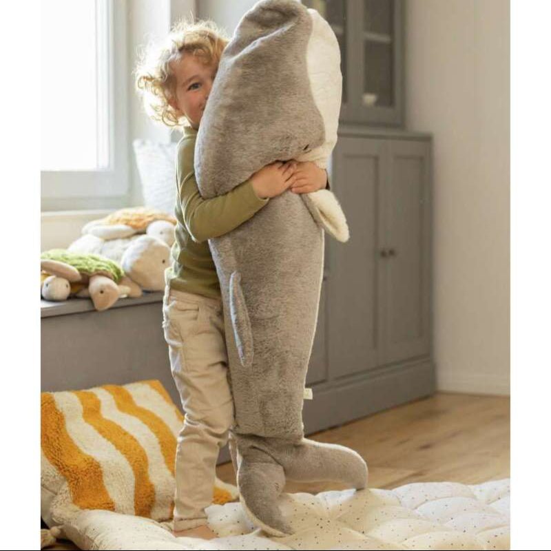 Child holding XXL Giant Whale