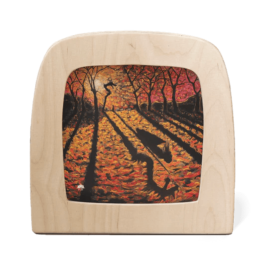 Silhouette of an autumn landscape of trees and a sunset on a white background