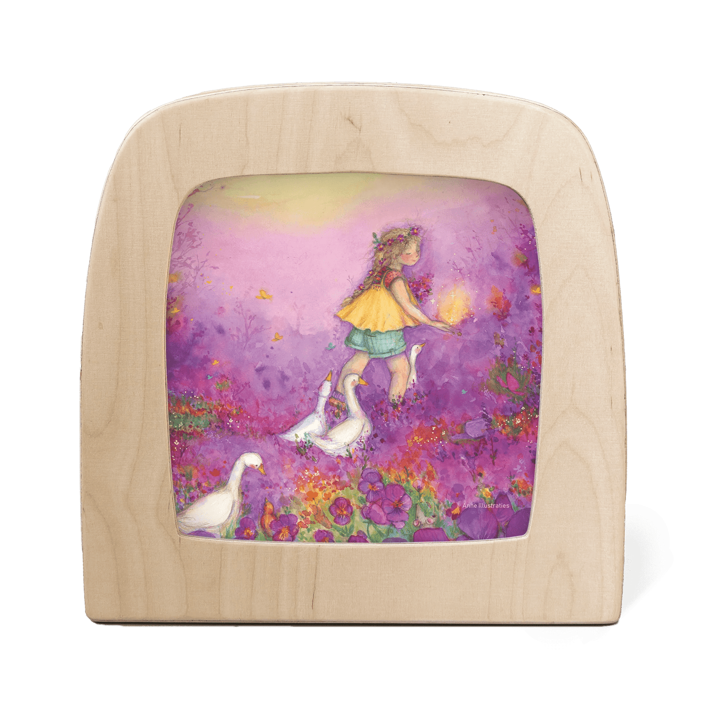 Wooden frame with silhouette of a girl in a purple flower field followed by white geese