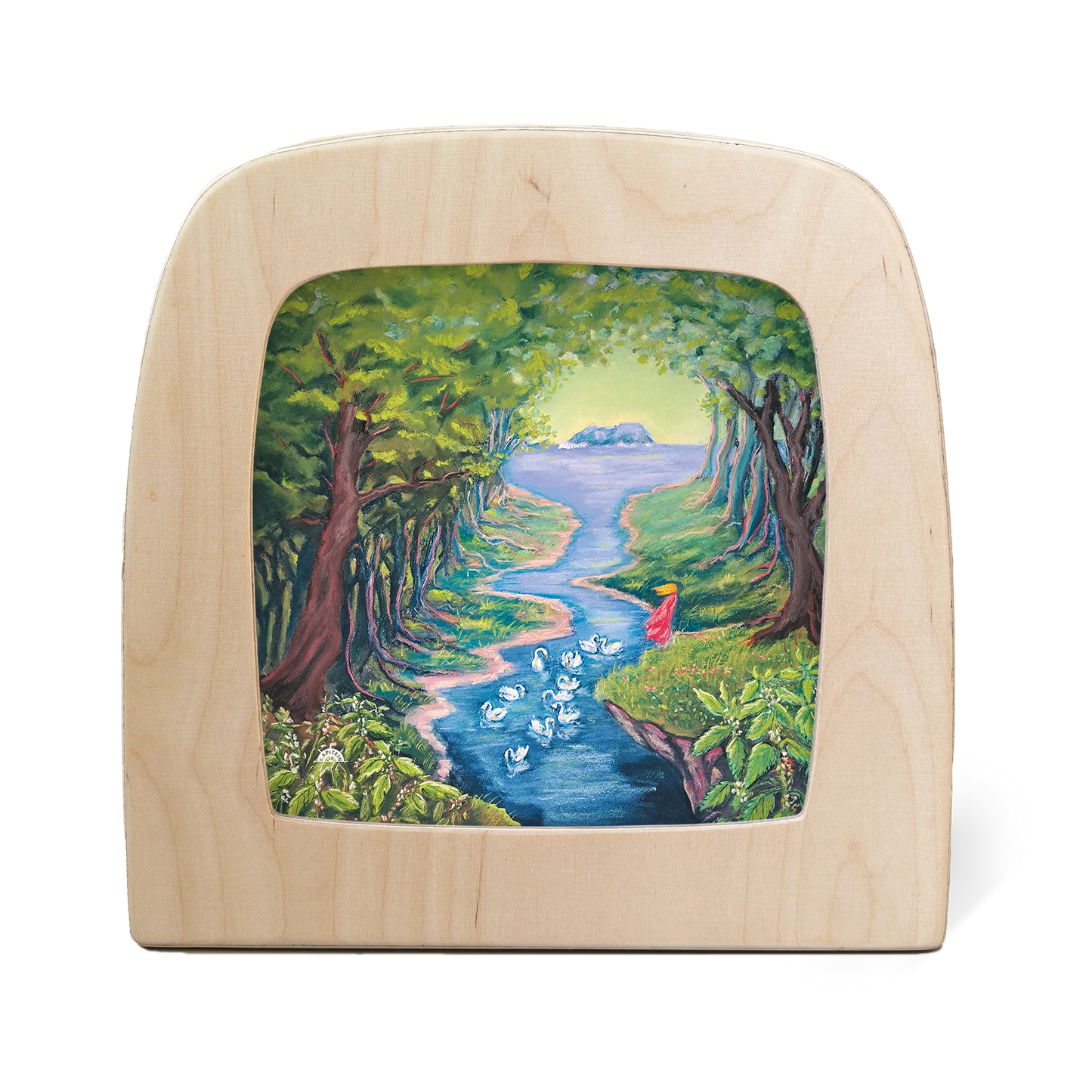 Wooden frame with silhouette of swans in a river surrounded by a forest