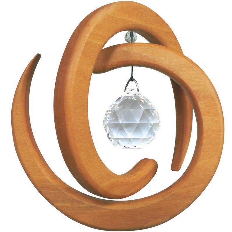 Wooden spiral suncatcher with a crystal ball on a white background