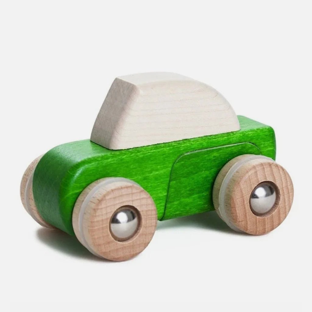Green wooden car with a white top on a white background