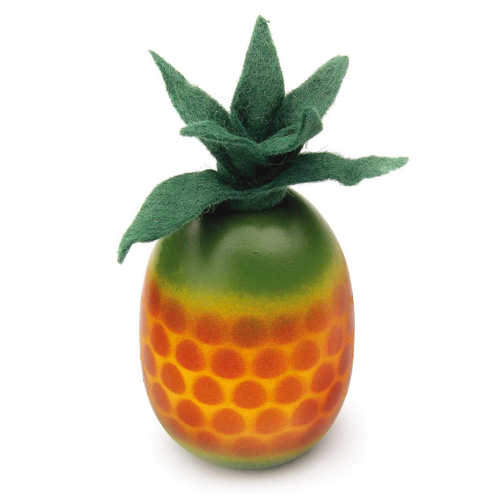Wooden pineapple with orange dots and a green stem on a white background