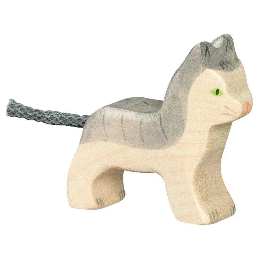 Wooden toy cat on a white background