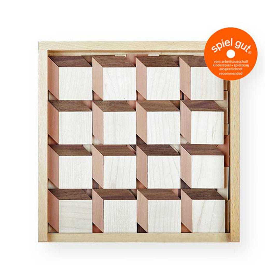 Wooden puzzle with geometric design on a white background, featuring the 'splel gut' logo.
