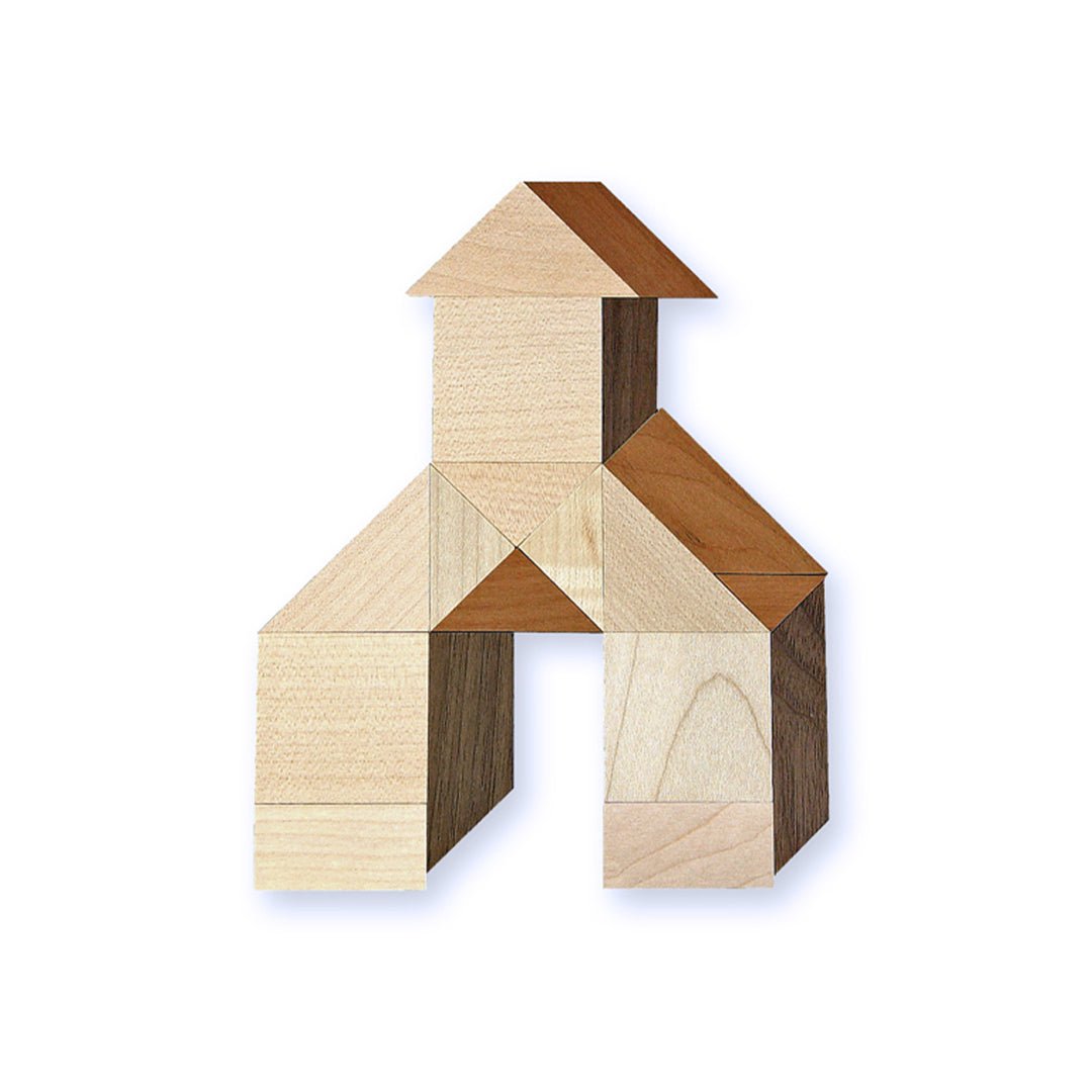 Wooden block puzzle in the shape of a house on a white background