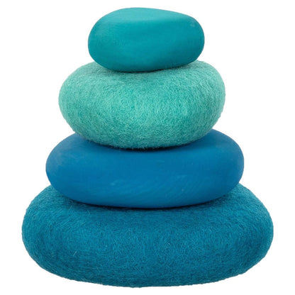 4 felt stones in blue tones stacked from largest to smallest on a white background
