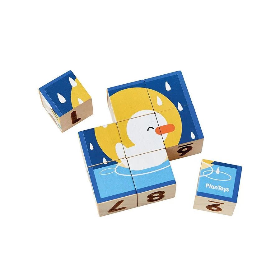 Cube puzzle made up of 9 blocks with a picture of a duck swimming on a white background
