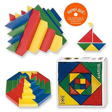 Colorful geometric building blocks with packaging and 'Spiel gut' logo on a white background