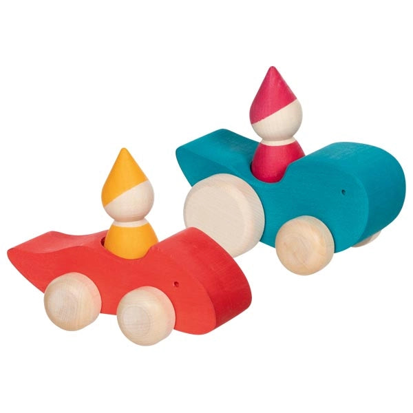 Two wooden vehicles with gnome peg people on a white background