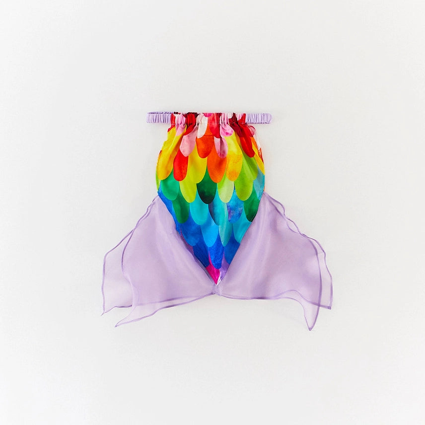 Silk mermaid skirt with rainbow scales and lavender fins on a white background