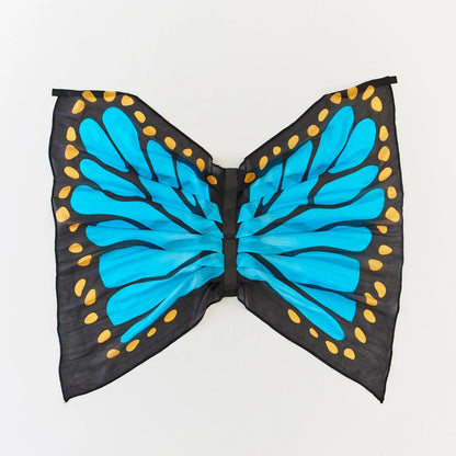 Blue silk butterfly wings with black edges and yellow dots