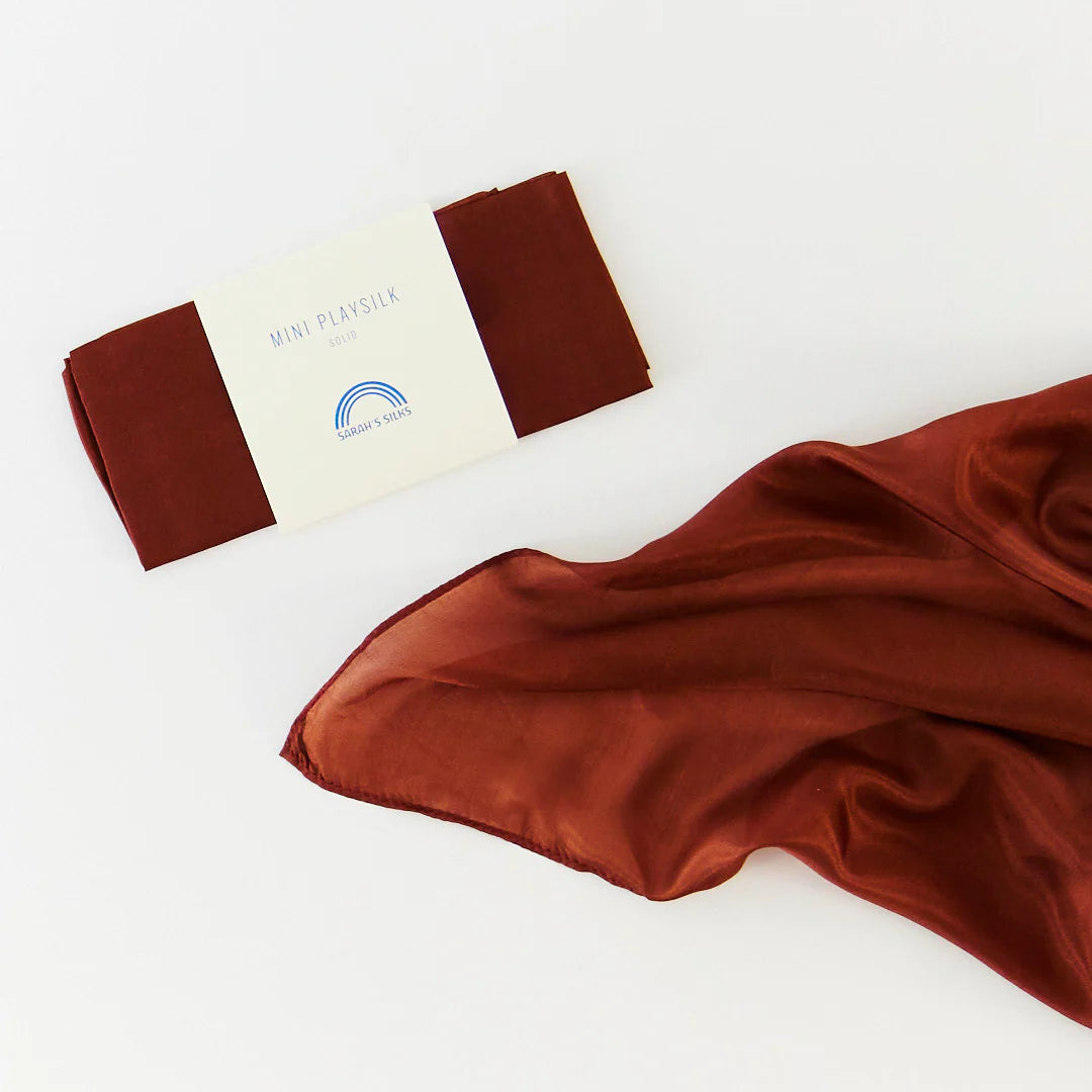 Brown playsilk on a white background