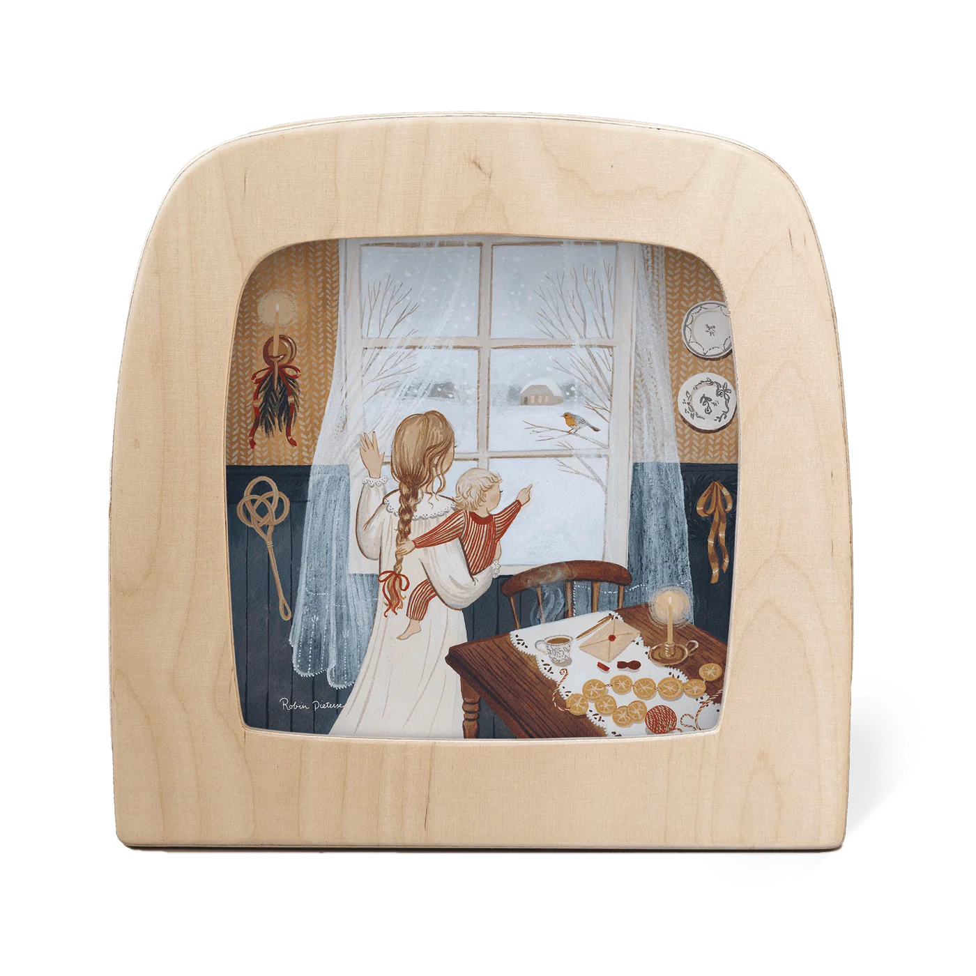 Wooden frame with a scene of two children by a window looking at a robin on a branch.