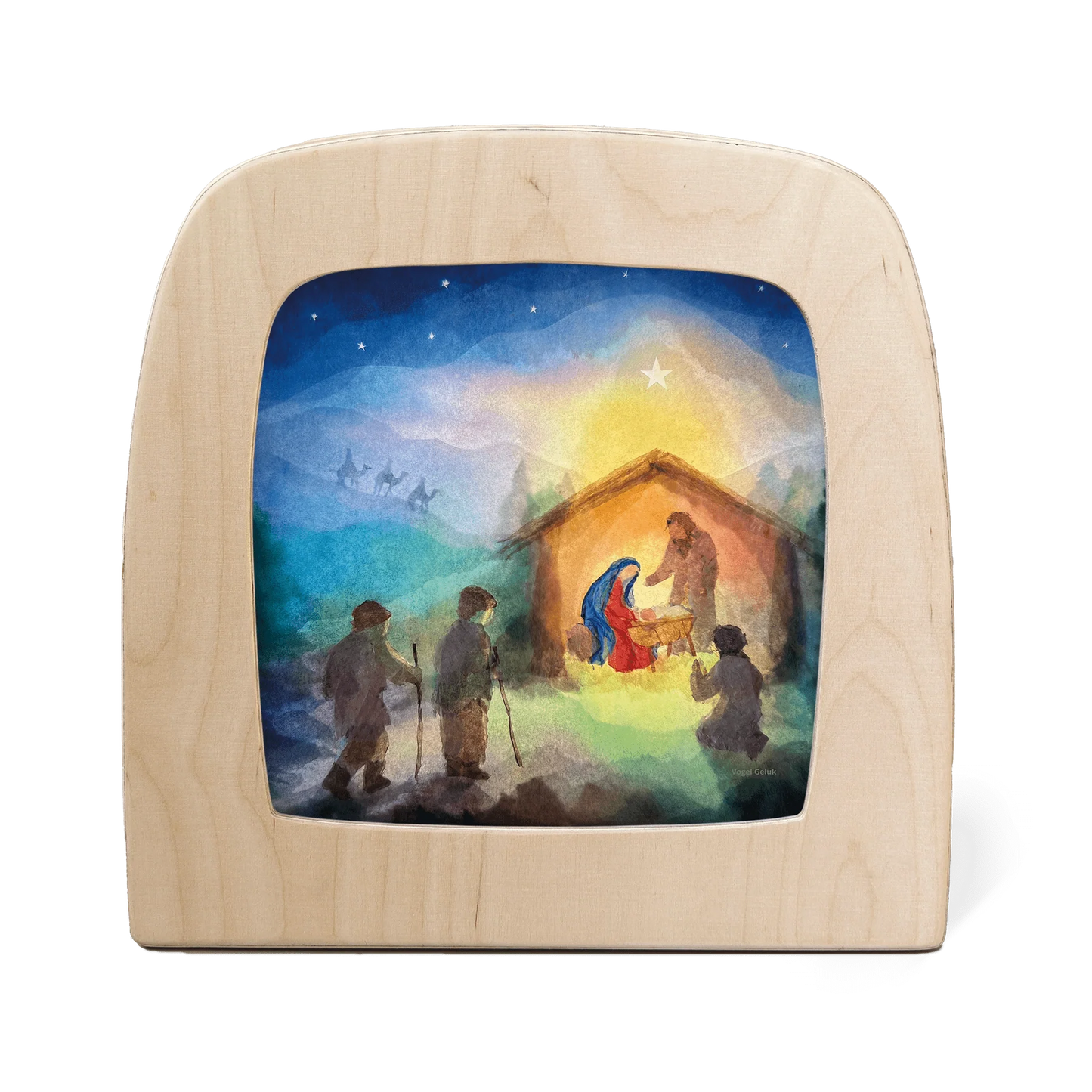 Wooden frame with a silhouette of a Nativity scene featuring Mary, Joseph, baby Jesus, the three wise men, and others gathered around the manger