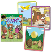 Set of animal-themed story cards with packaging on a white background