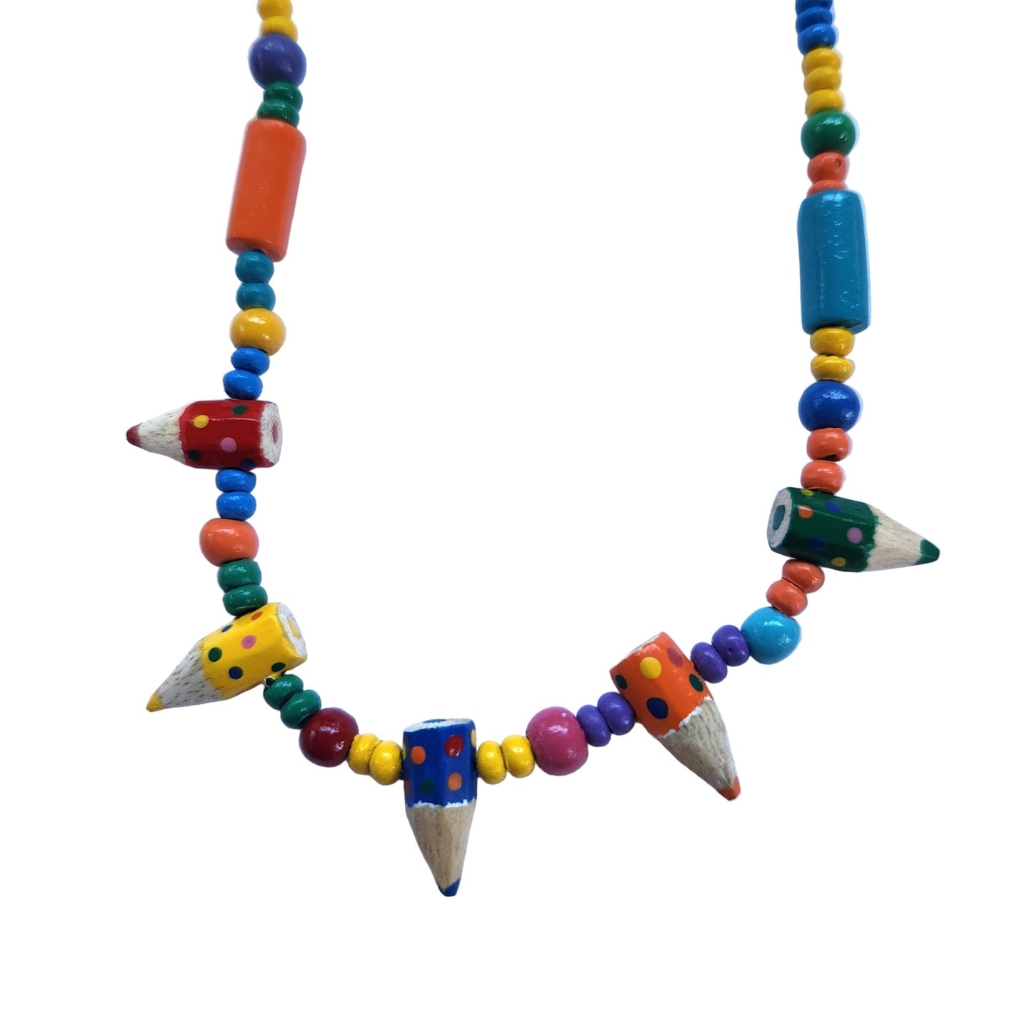 Close up of colorful wooden beaded necklace with pencil tip pendants on a white background