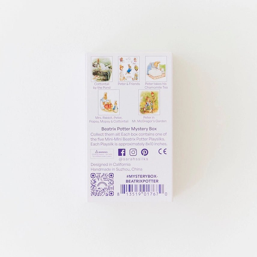 The back of a white 'Beatrix Potter Mystery Box' package, featuring illustrations of five classic stories on a clean white background.