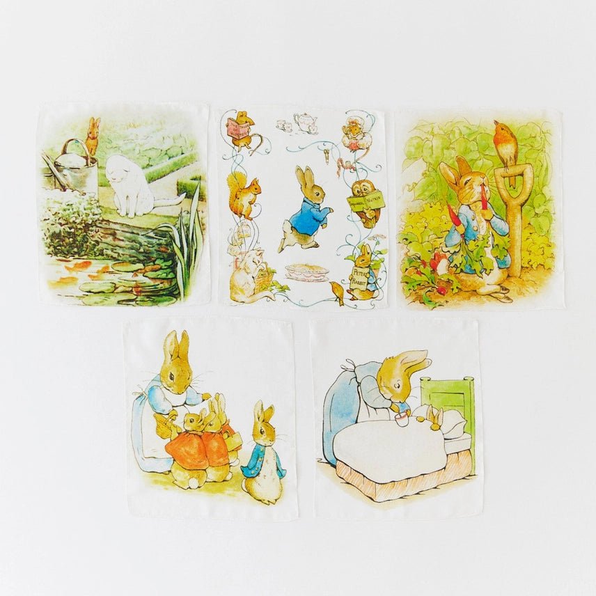 Set of mini playsilks featuring illustrations from Beatrix Potter on a white background.
