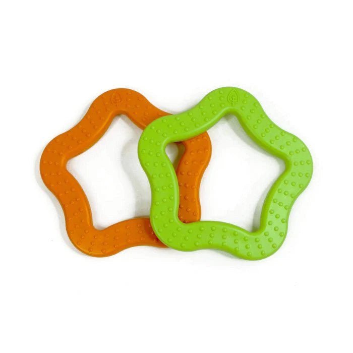 Two star-shaped orange and green baby teether toys on a white background
