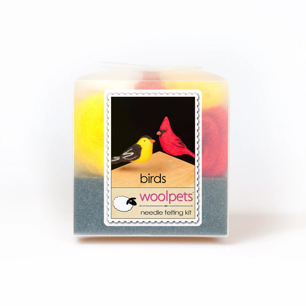 Frosted plastic box containg birds needle felting kit with woolpets branding
