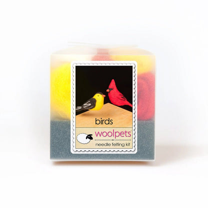 Frosted plastic box containg birds needle felting kit with woolpets branding