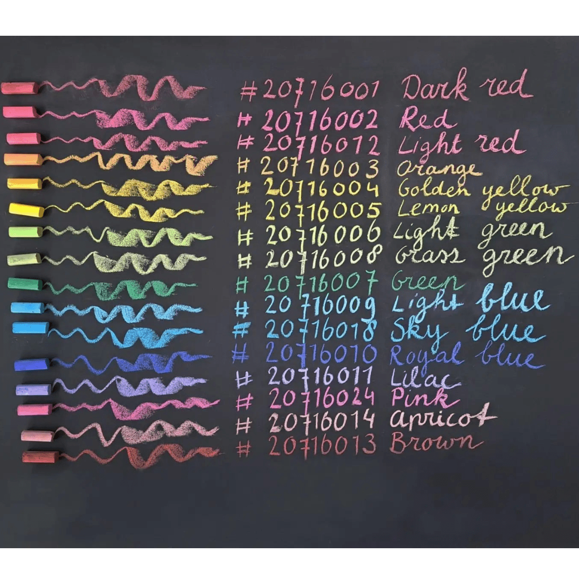 Assorted colored chalks on a blackboard with color names and codes.