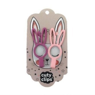 Two bunny-shaped hair clips in pink and purple on a 'cuty clips' branded card with a plain background.