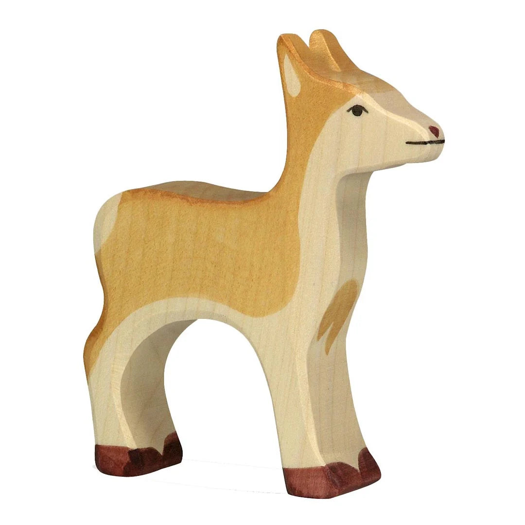 Wooden deer figurine on a white background