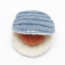 Felted clam on a white background