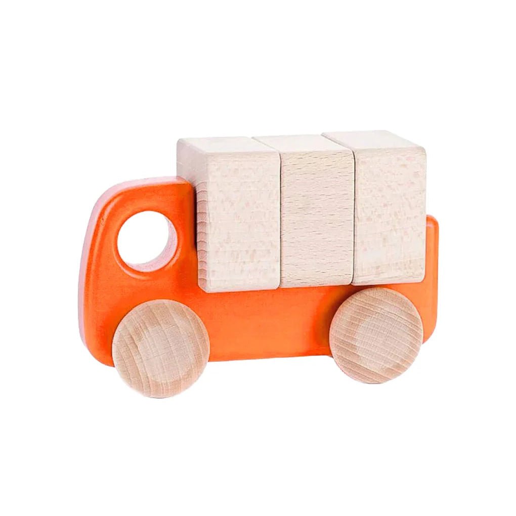 A wooden toy truck with an orange body and wheels, carrying three light natural wood cargo blocks, shown on a plain white background.