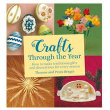 Book cover of 'Crafts Through the Year' with decorative items and colorful text.